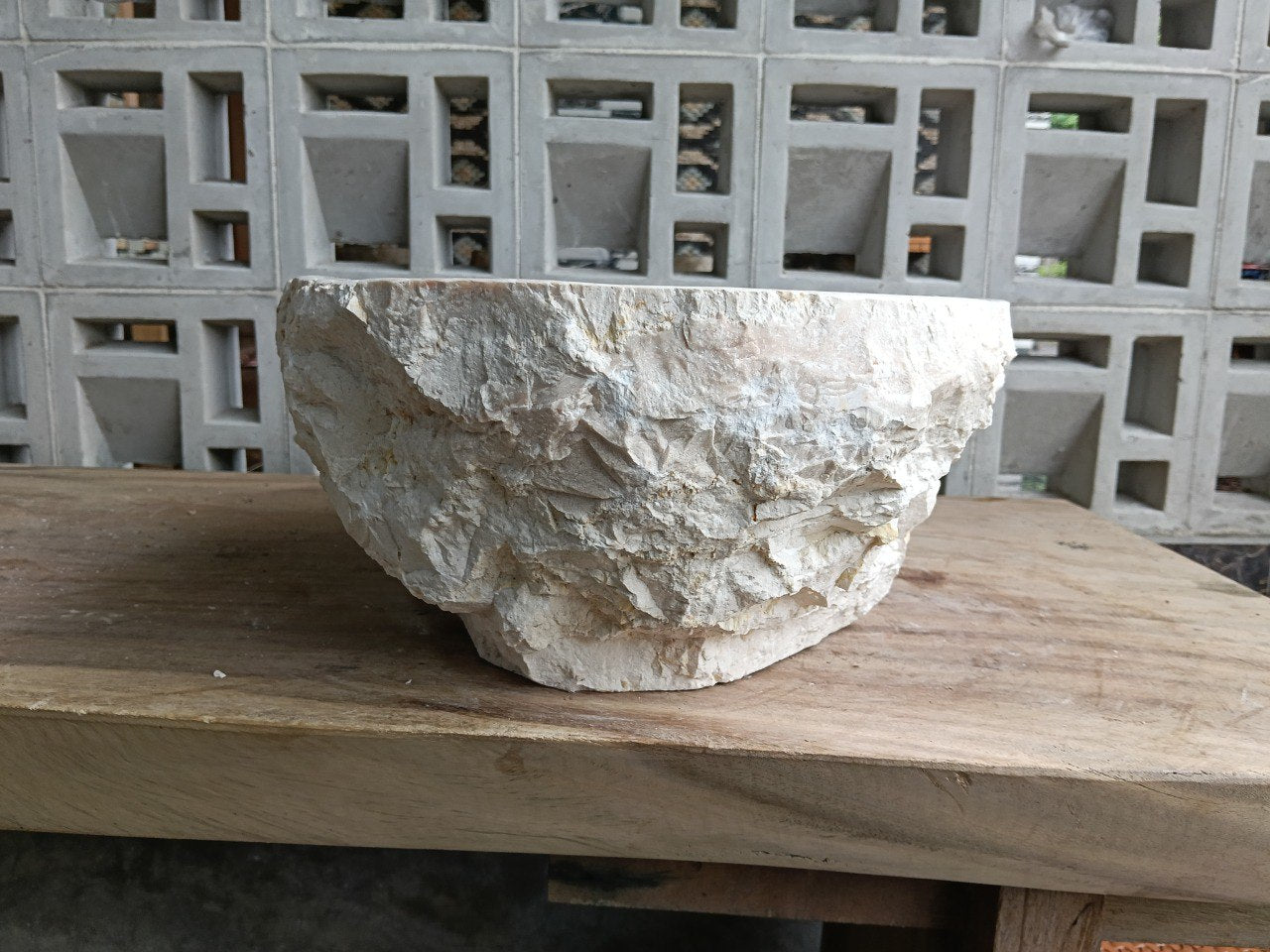 Back side showing raw marble exterior texture