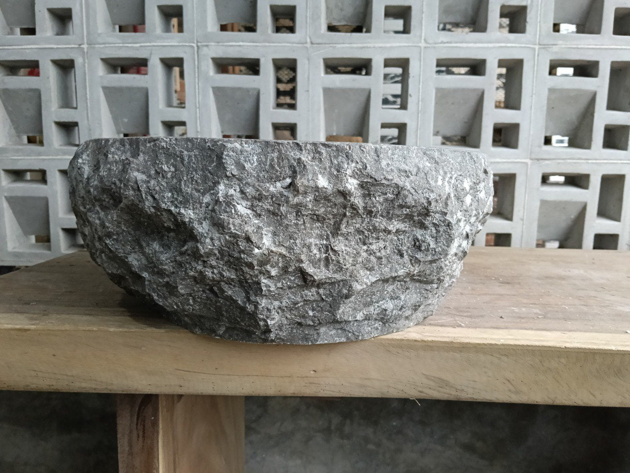 Back side of polished gray marble bathroom sink