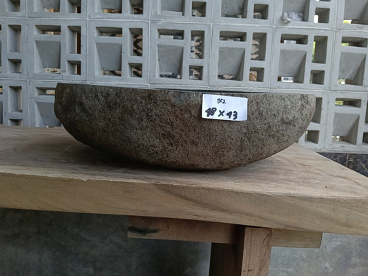 Front view of 6952-4843 natural river rock vessel sink, organic oval shape