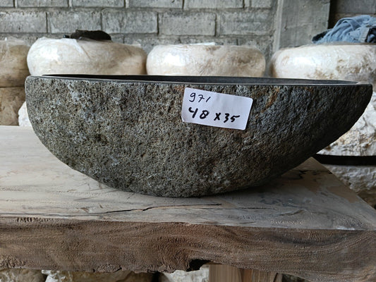 Front view of 6971-4835 natural river rock vessel sink, raw textured exterior