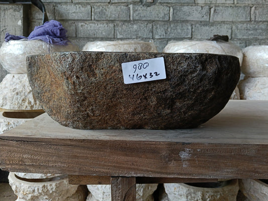 Front view of 6980-4632 natural river rock vessel sink, warm brown-gray exterior