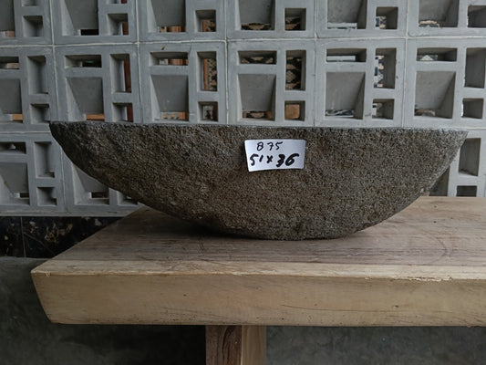 Front view of 6875-5136 river stone basin — polished interior