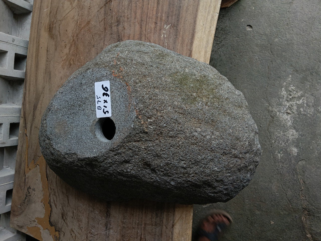 Bottom view of 6875-5136 solid river stone vessel