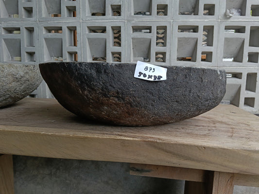 Front view of 6873-5038 river stone basin — polished interior