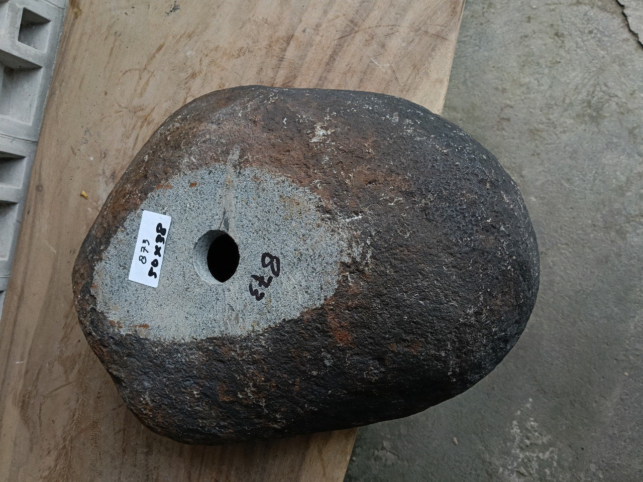 Bottom view of 6873-5038 solid river stone vessel
