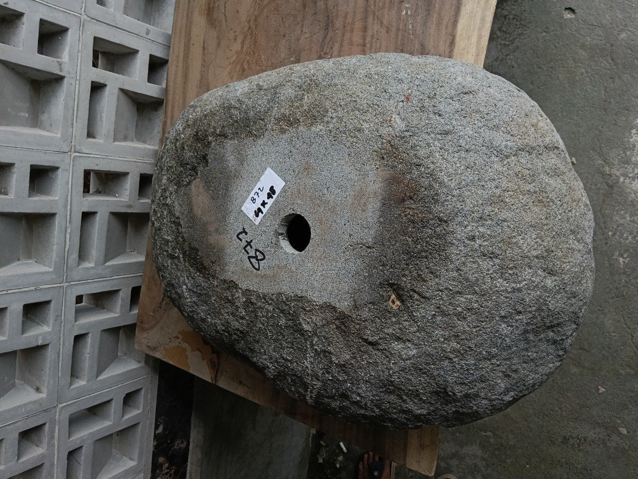 Bottom view of 6872-6448 solid river stone vessel