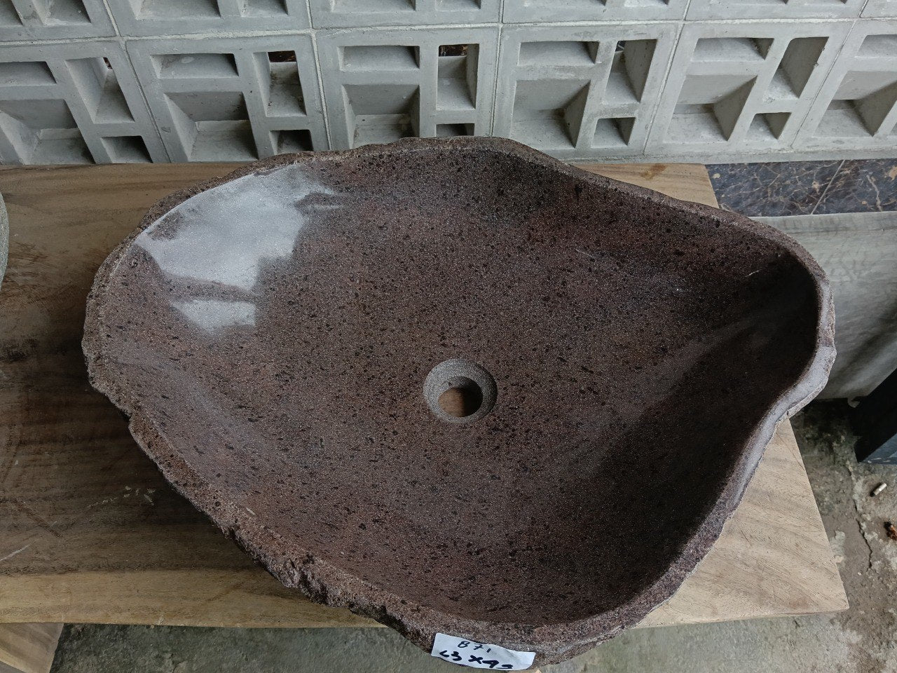 Top view of 6871-6349 reddish-brown river stone sink — handcrafted natural stone