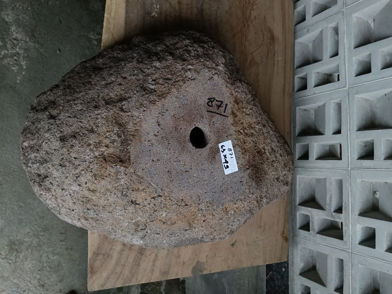 Bottom view of 6871-6349 solid river stone vessel