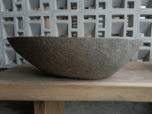Front view of 6842-5138 river stone basin — polished interior