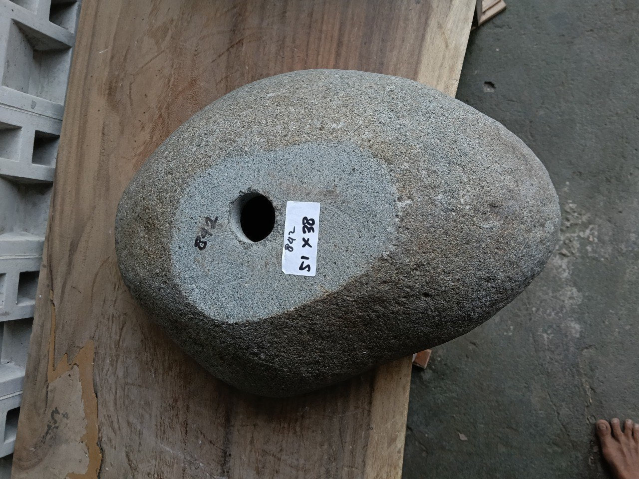 Bottom view of 6842-5138 solid river stone vessel