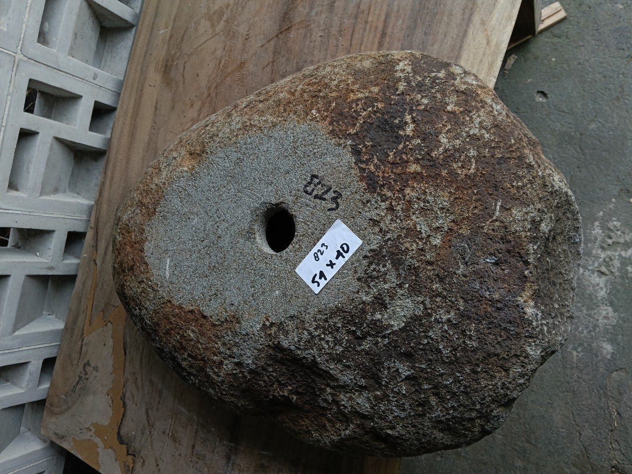 Bottom view of 6823-5440 solid river stone vessel