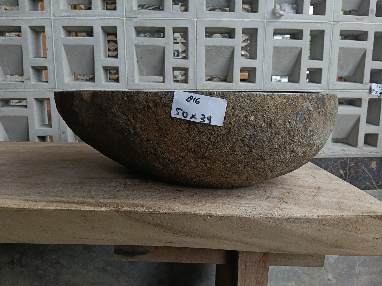 Front view of 6816-5039 river stone basin — polished interior
