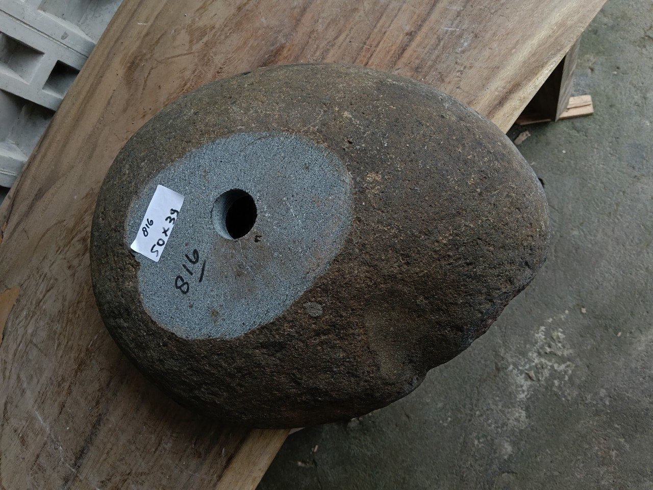 Bottom view of 6816-5039 solid river stone vessel