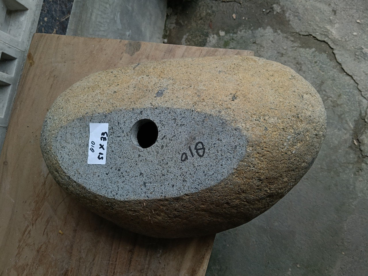 Bottom view of 6810-5133 solid river stone vessel