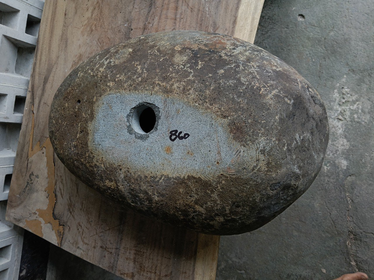 Bottom view of 6860-5436 solid river stone vessel