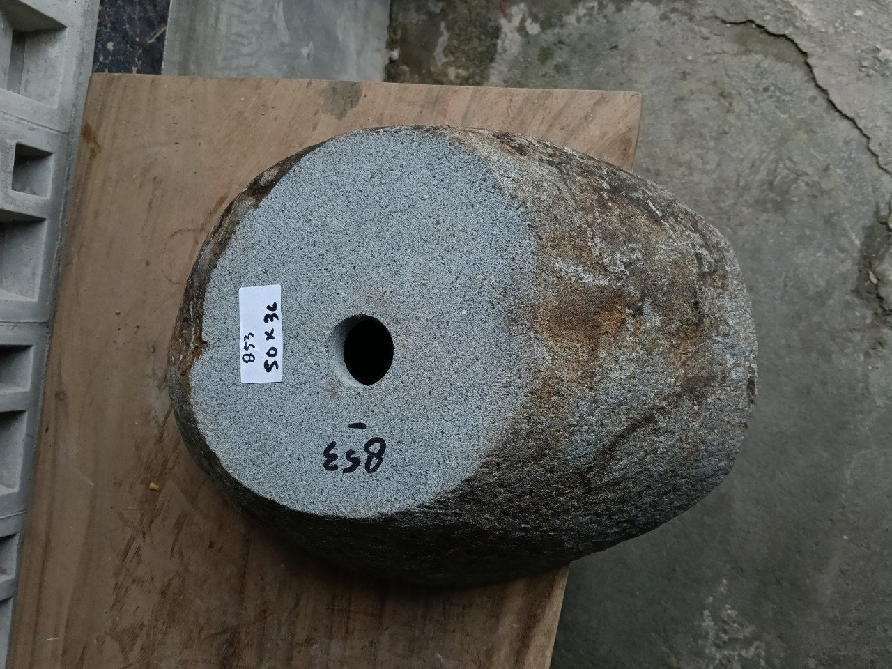 Bottom view of 6853-5036 solid river stone vessel