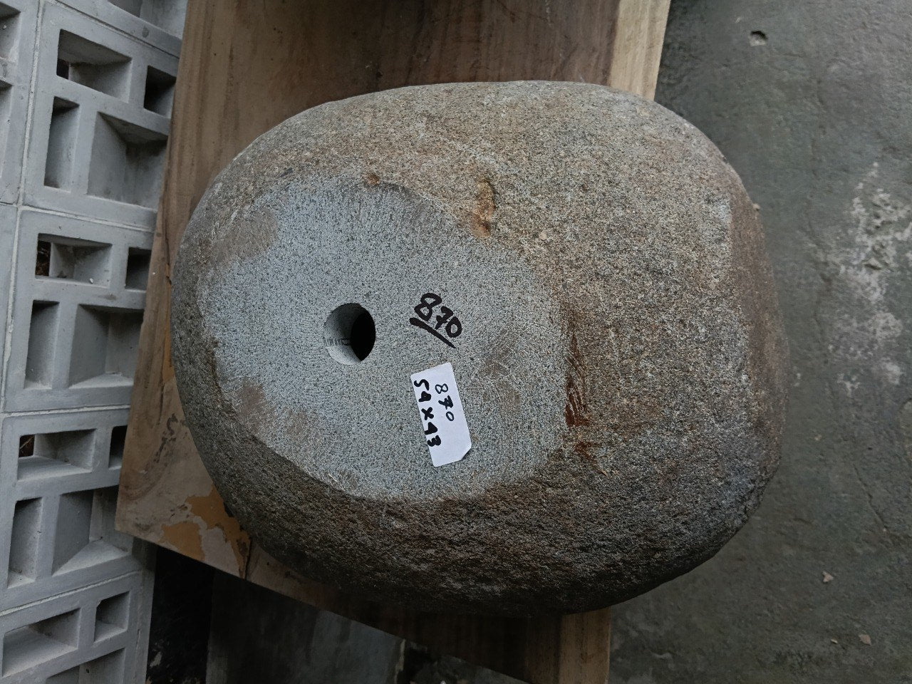 Bottom view of 6870-5443 solid river stone vessel