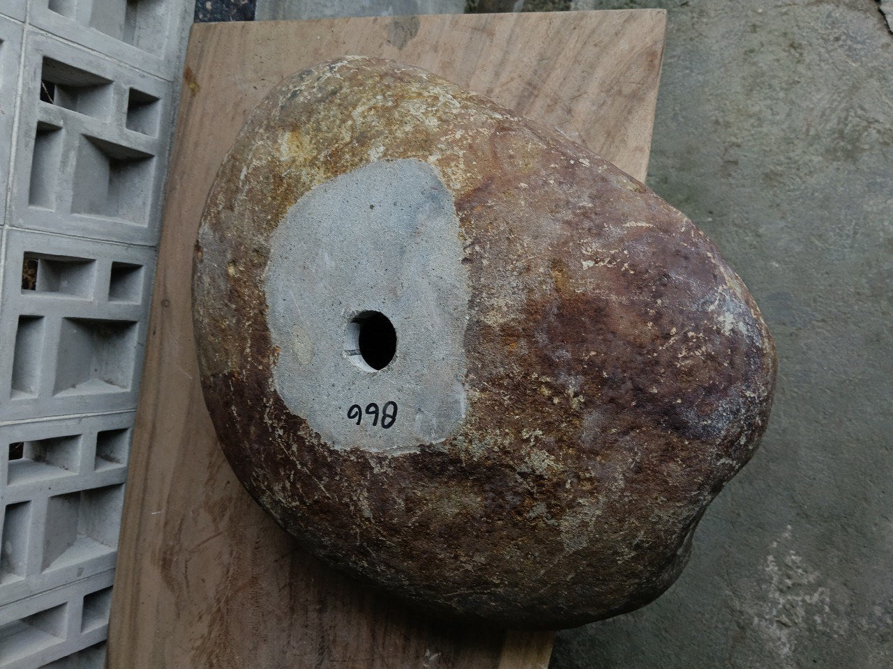 Bottom view of 6866-5643 solid river stone vessel