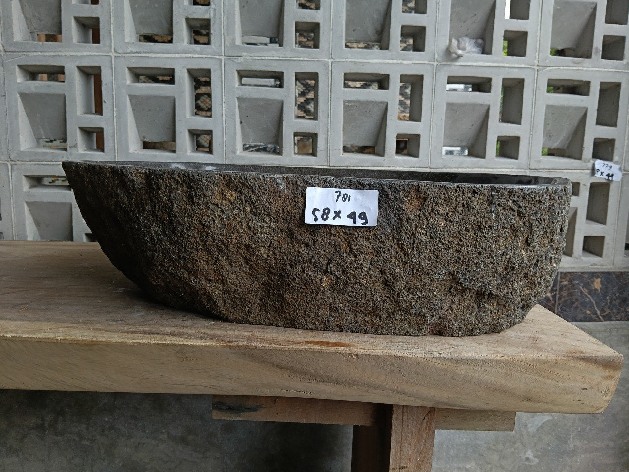 Front view of 6781-5849 river stone basin — polished interior