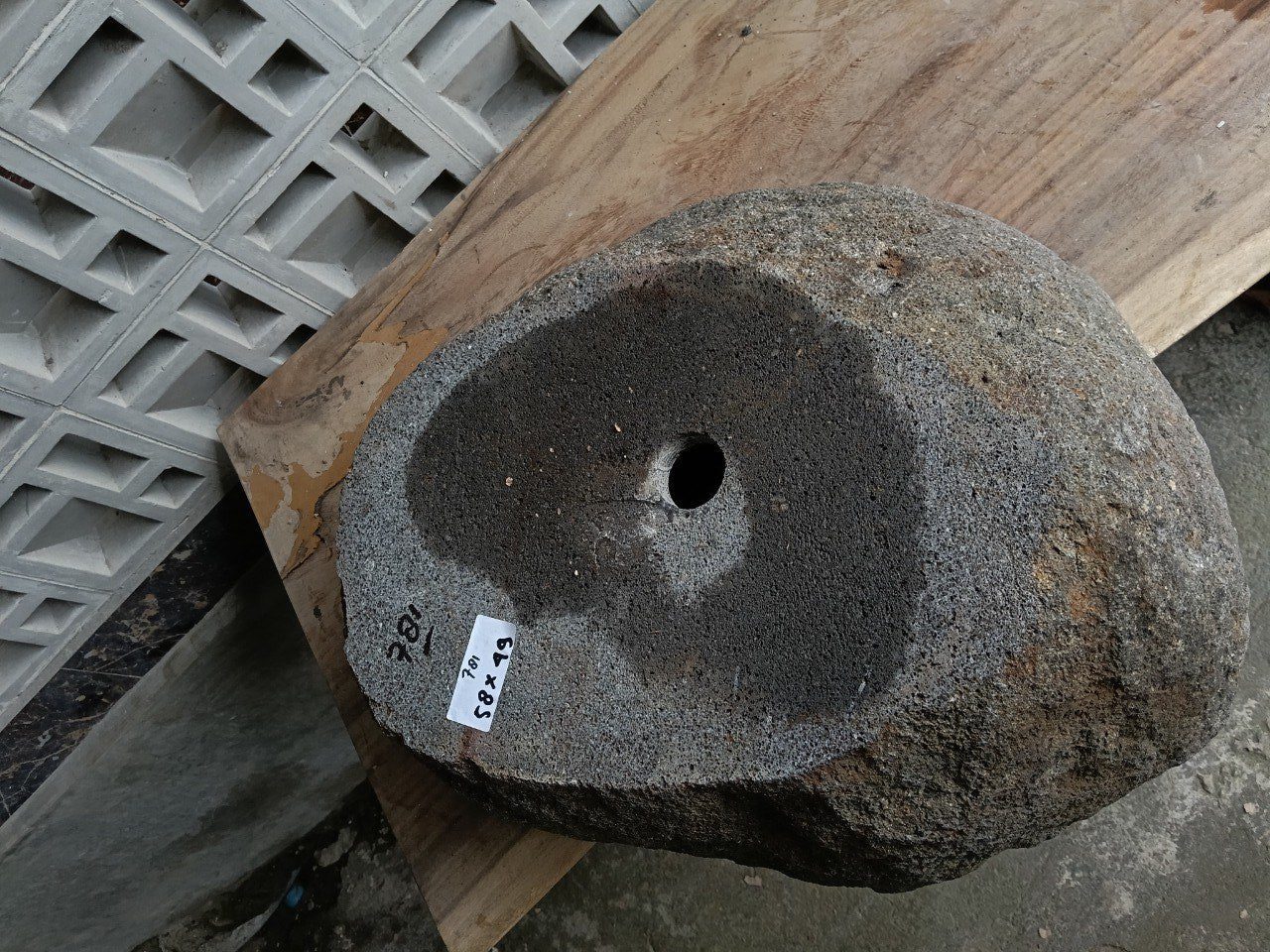 Bottom view of 6781-5849 solid river stone vessel