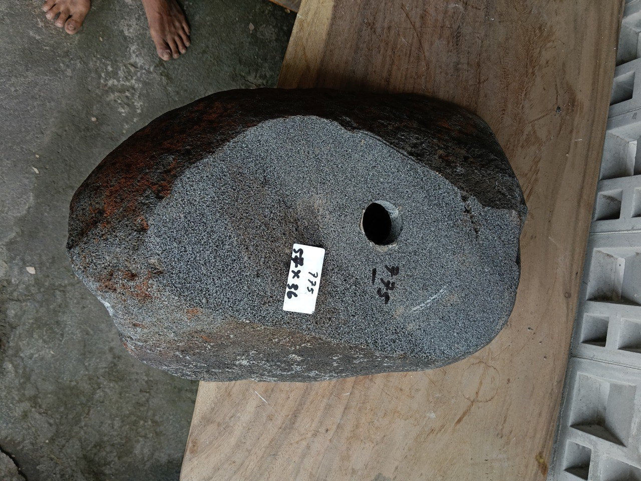 Bottom view of 6775-5736 solid river stone vessel