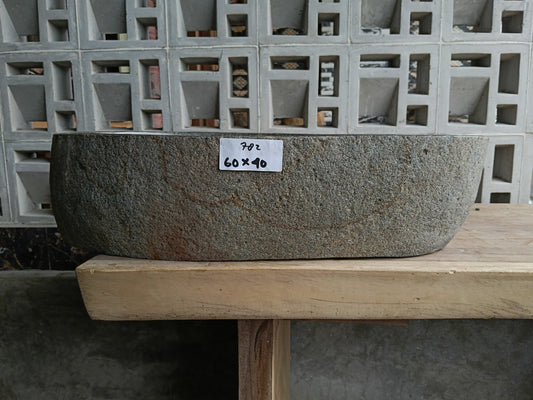 Front view of 6782-6040 river stone basin — polished interior