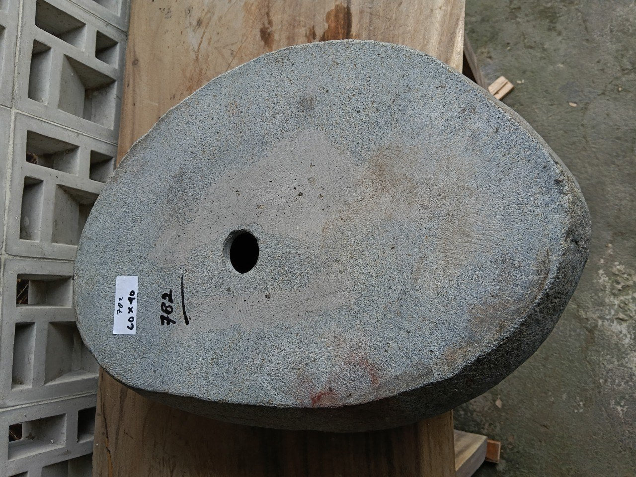 Bottom view of 6782-6040 solid river stone vessel