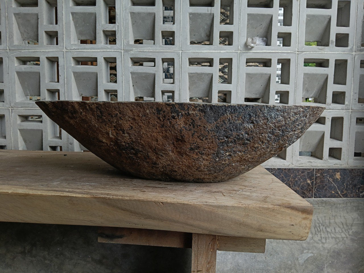 Back view of 6777-6338 natural stone vessel — textured exterior