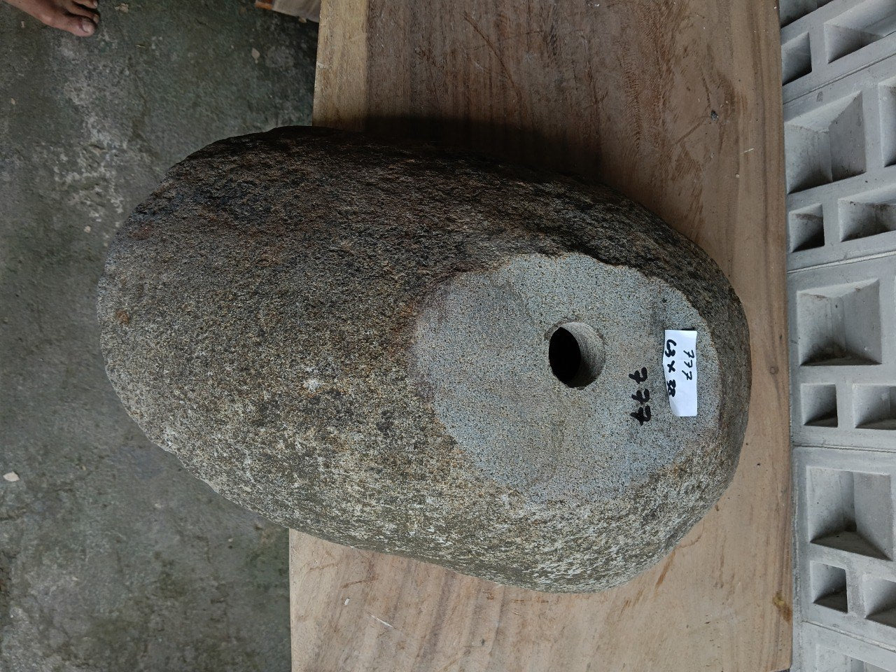 Bottom view of 6777-6338 solid river stone vessel