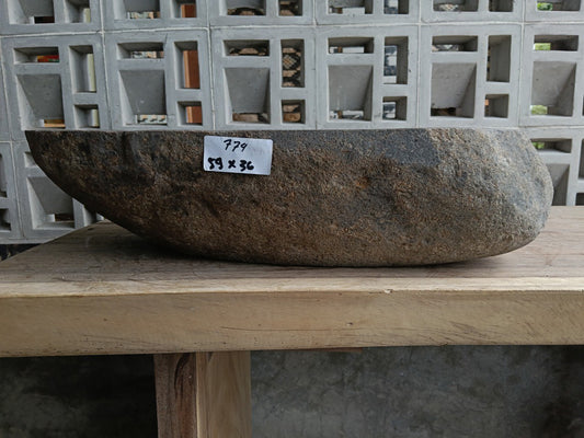 Front view of 6774-5936 river stone basin — polished interior