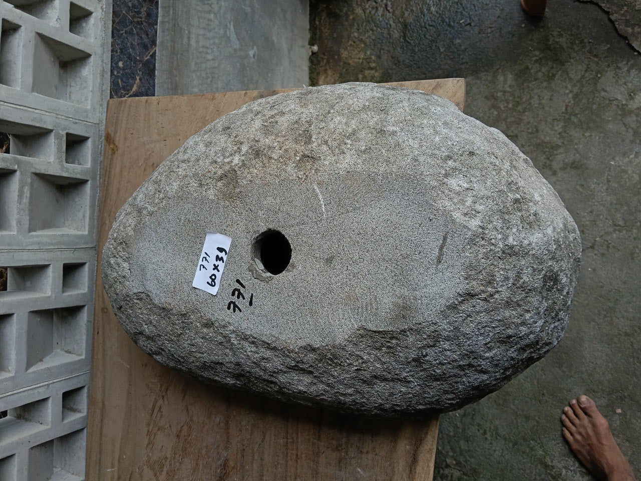 Bottom view of 6771-6039 solid river stone vessel