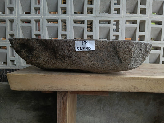 Front view of 6770-5640 river stone basin — polished interior