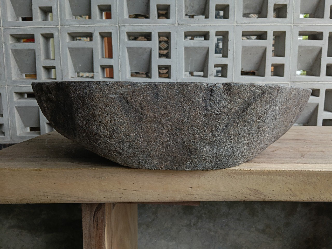 Back view of 6770-5640 natural stone vessel — textured exterior