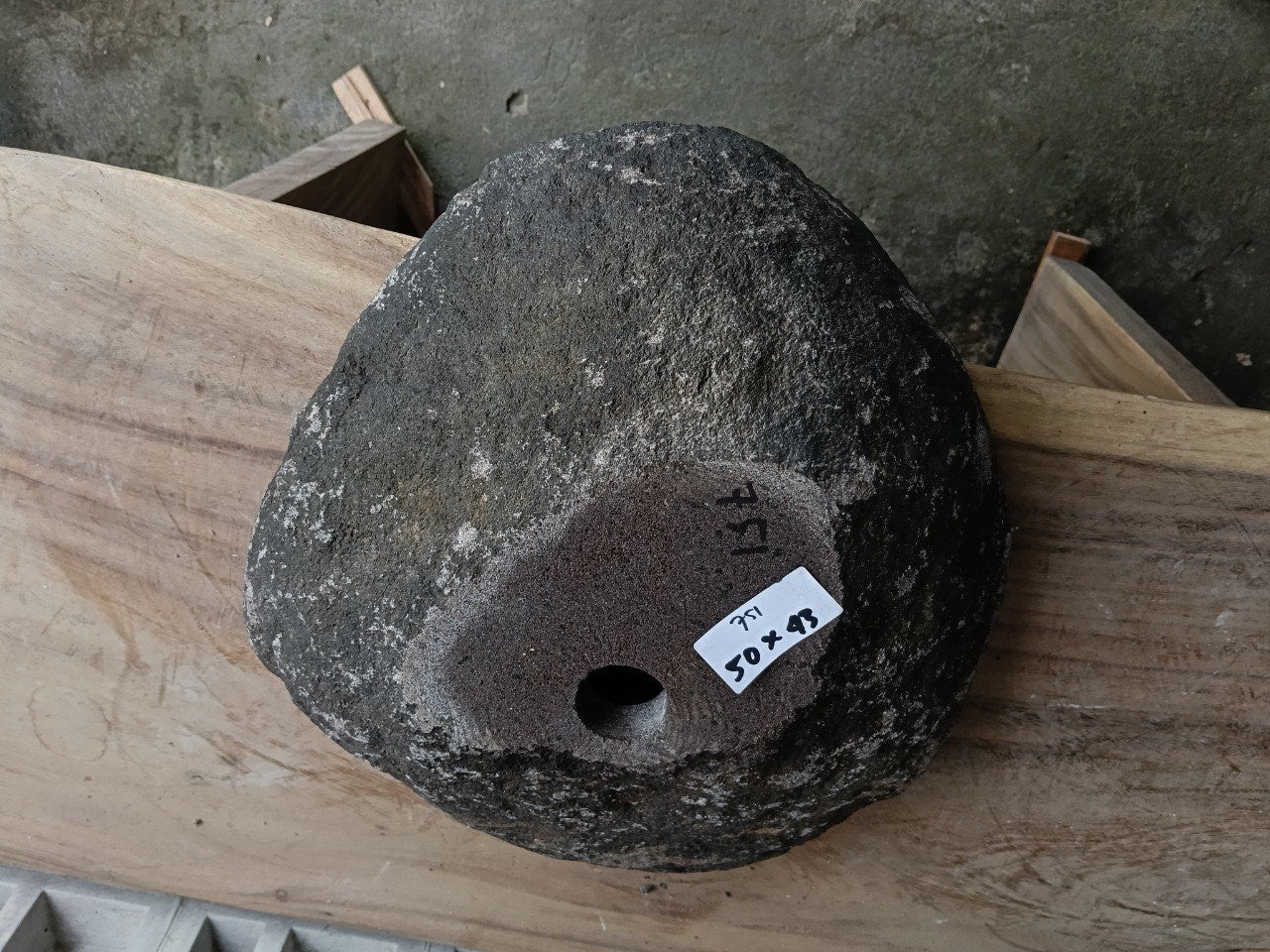Bottom view of 6751-5043 solid river stone vessel
