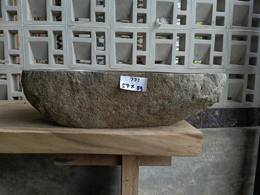 Front view of 6773-5739 river stone basin — polished interior