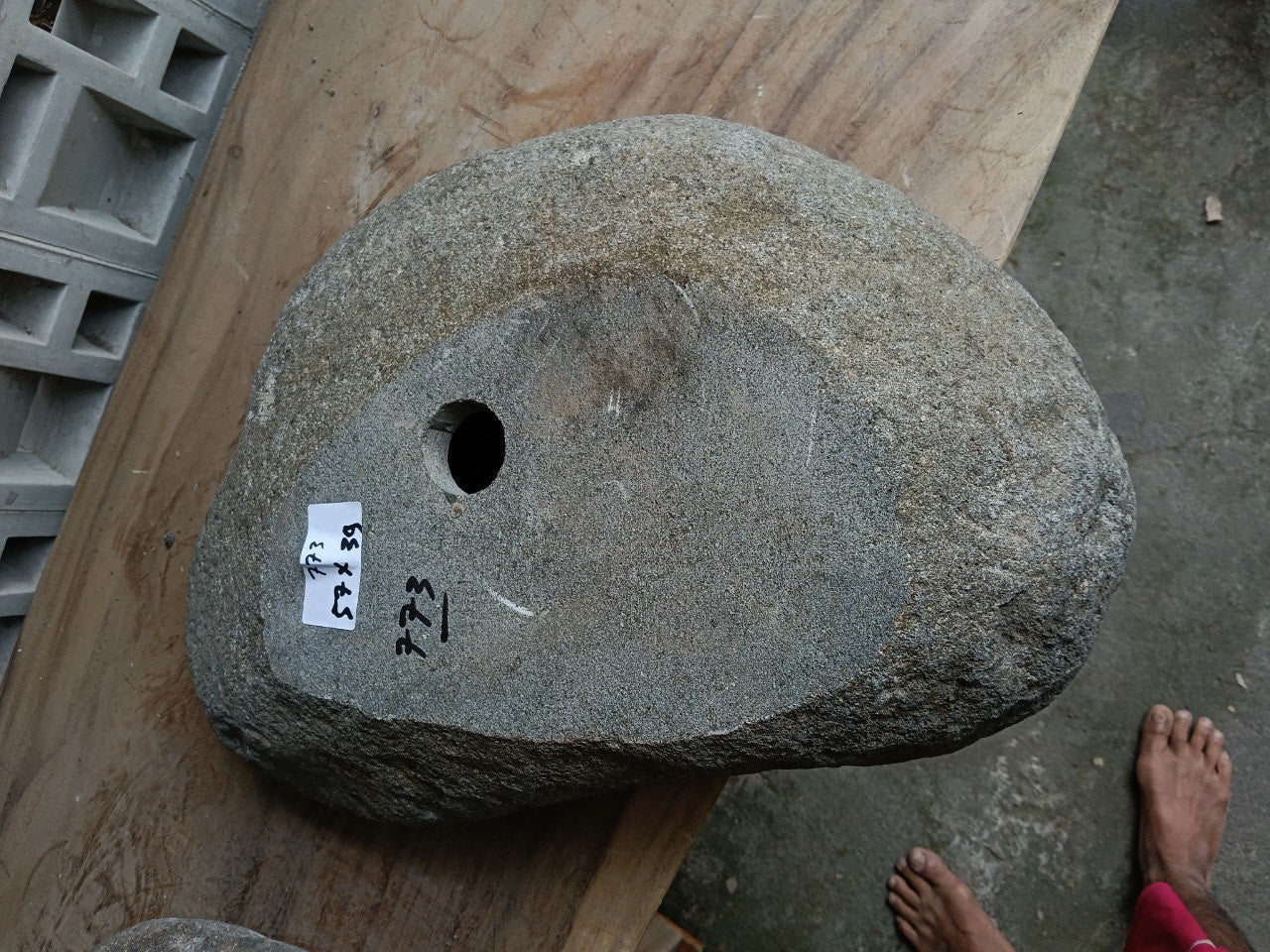 Bottom view of 6773-5739 solid river stone vessel