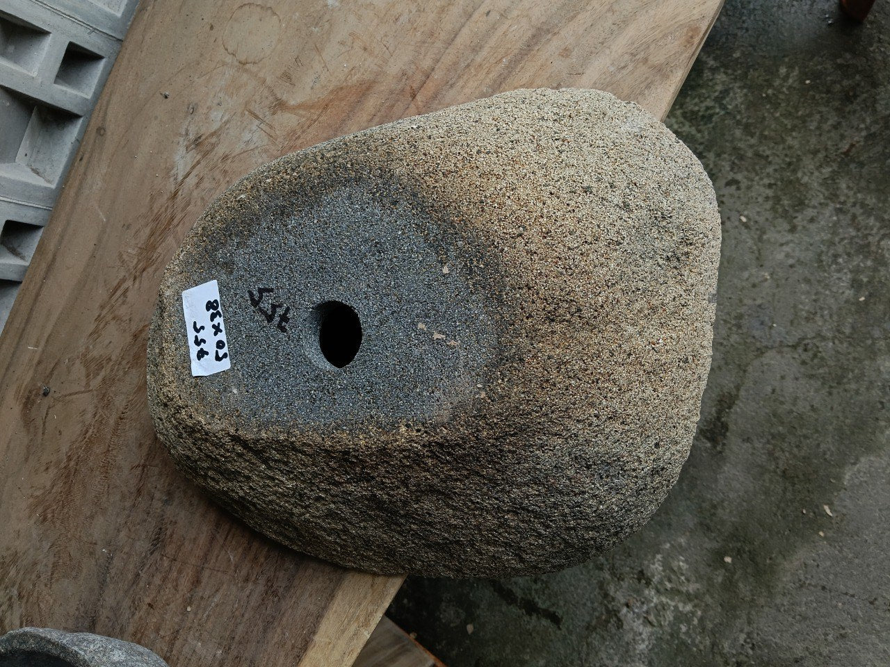 Bottom view of 6755-5038 solid river stone vessel