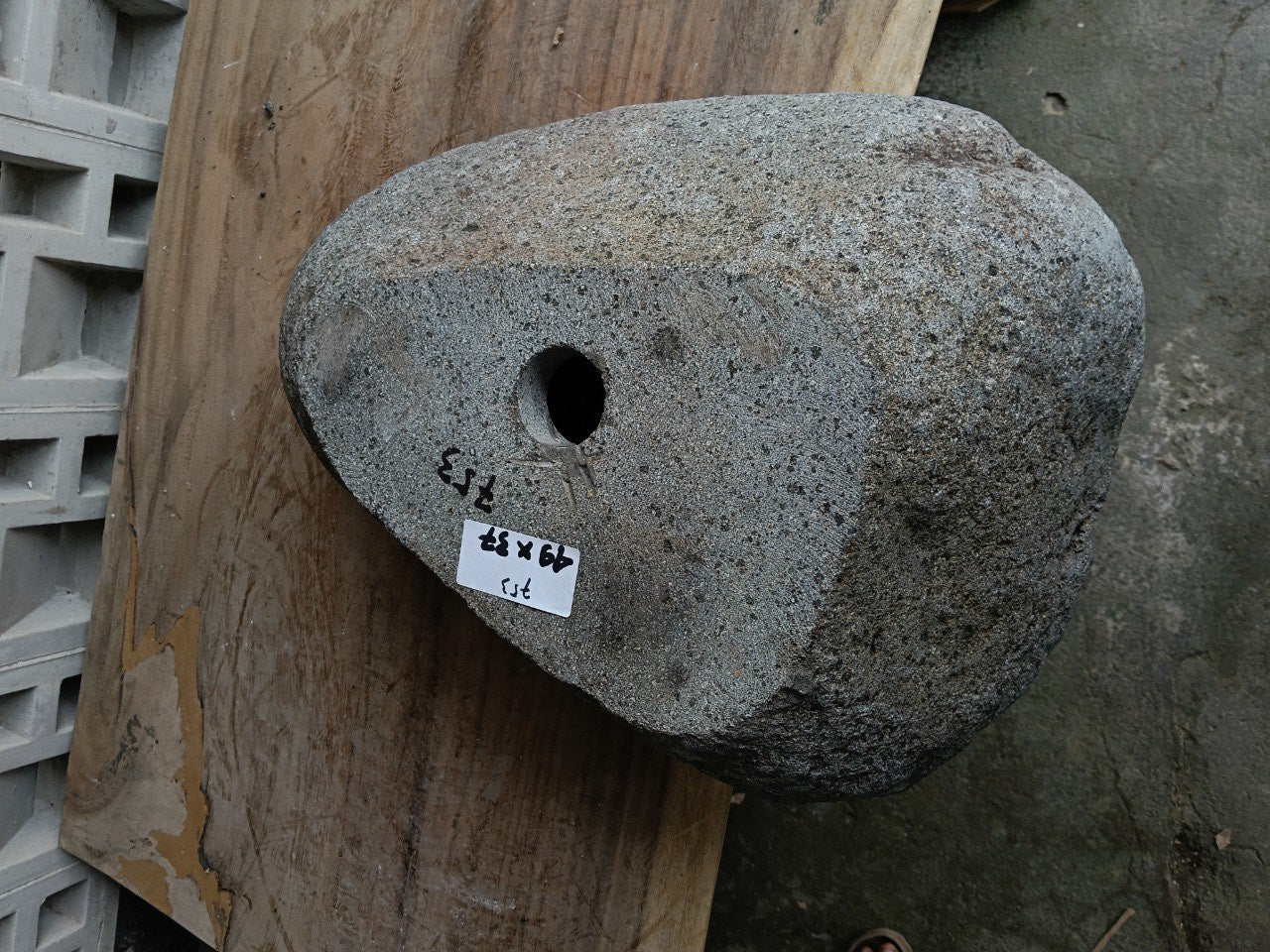 Bottom view of 6753-4937 solid river stone vessel