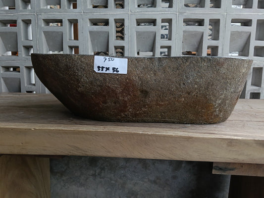 Front view of 6750-5536 river stone basin — polished interior