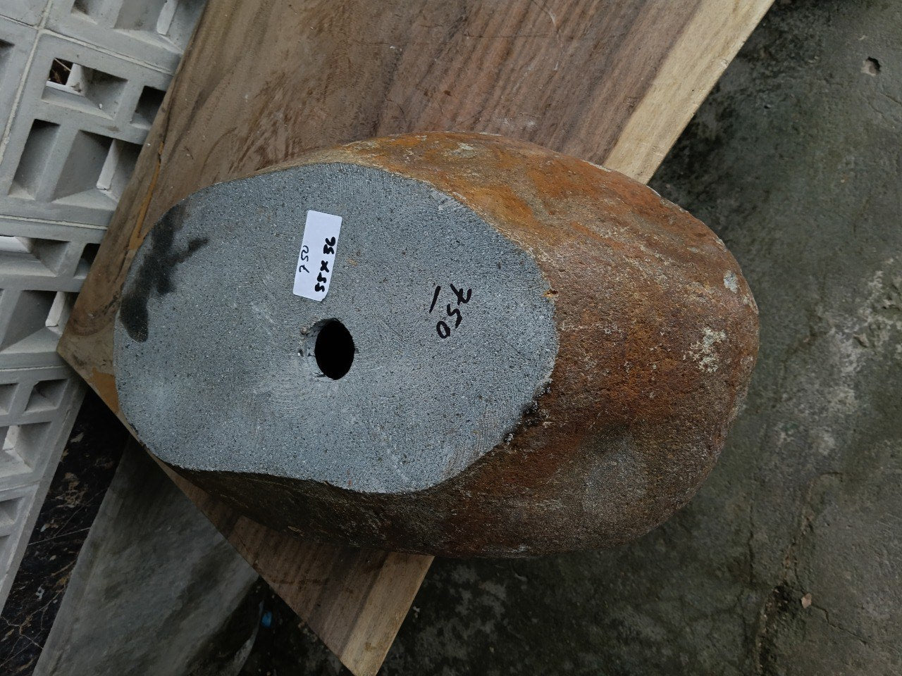 Bottom view of 6750-5536 solid river stone vessel