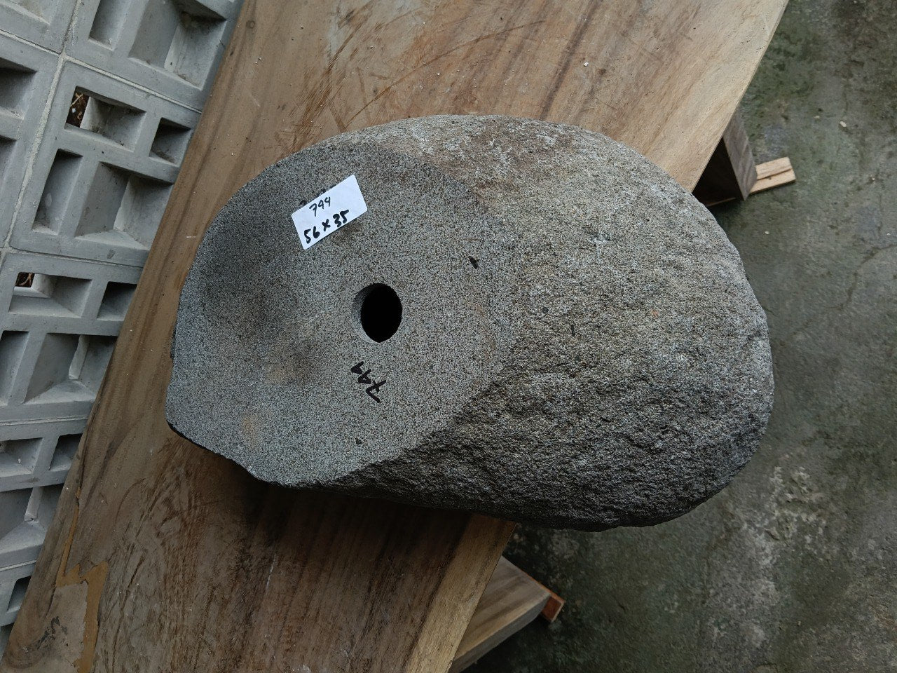 Bottom view of 6744-5635 solid river stone vessel