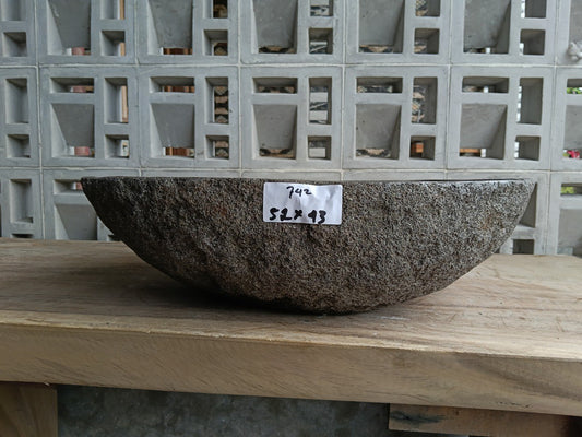 Front view of 6742-5243 river stone basin — polished interior