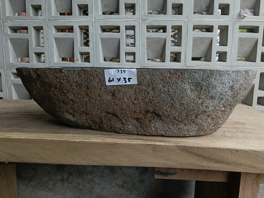 Front view of 6739-6135 river stone basin — polished interior