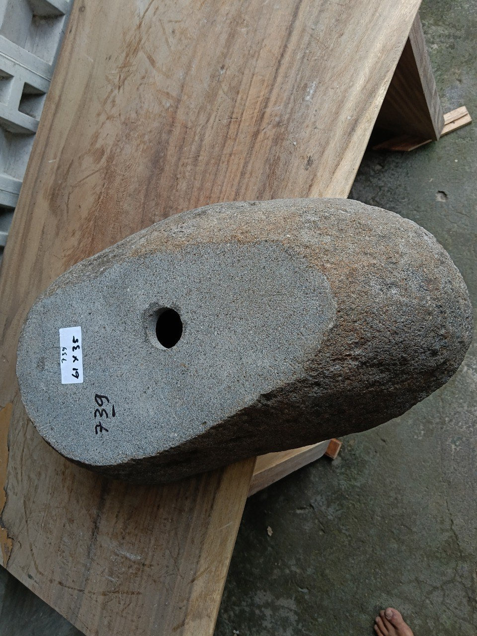 Bottom view of 6739-6135 solid river stone vessel