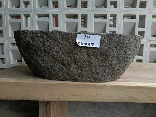 Front view of 6730-5037 river stone basin — polished interior