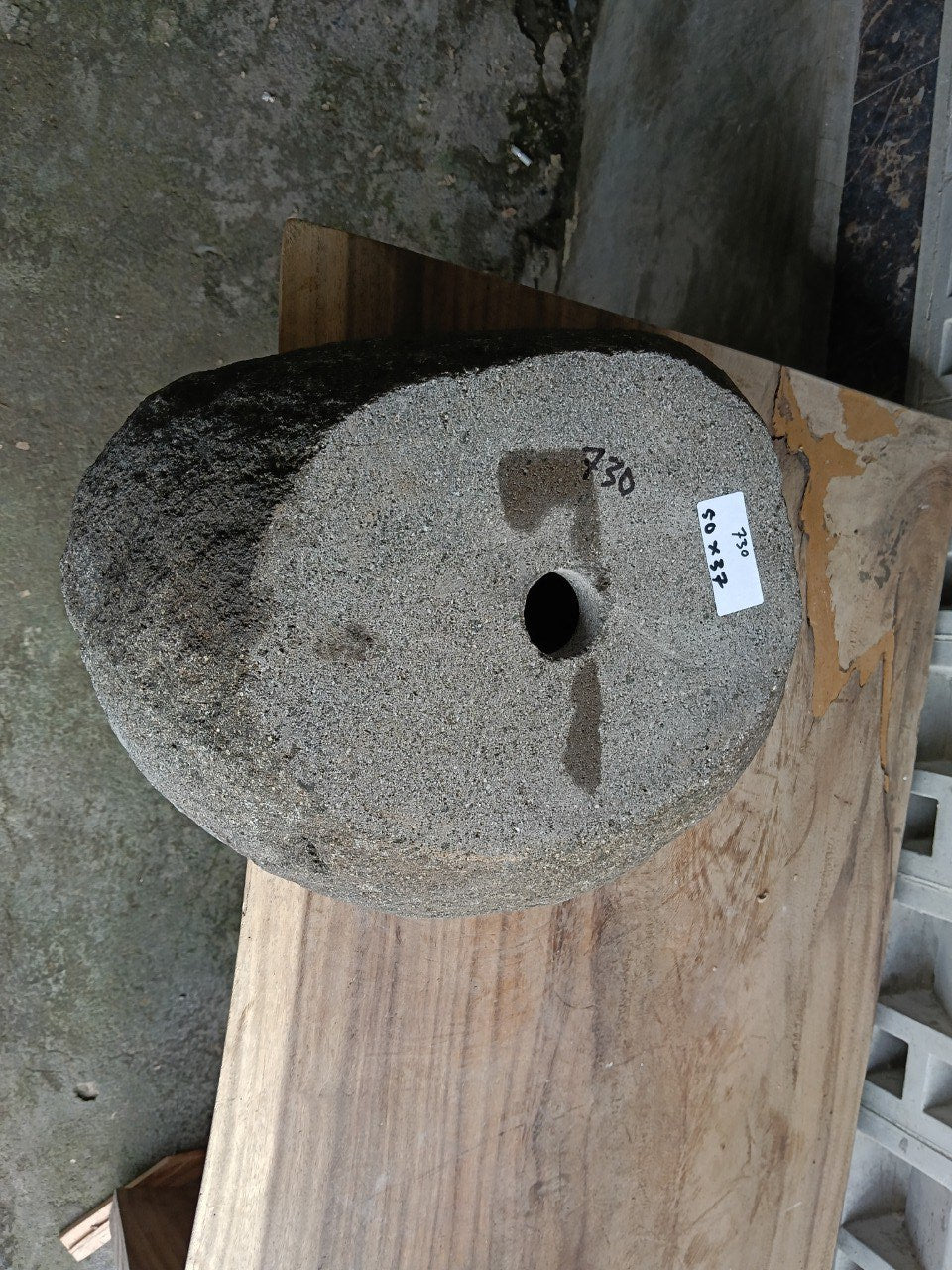 Bottom view of 6730-5037 solid river stone vessel