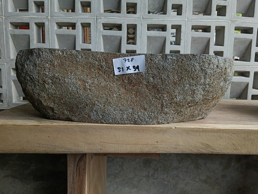 Front view of 6728-5134 river stone basin — polished interior