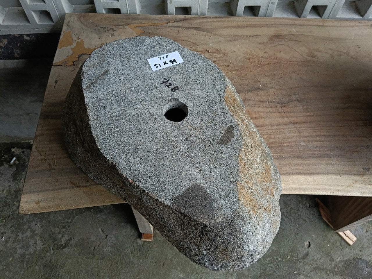 Bottom view of 6728-5134 solid river stone vessel