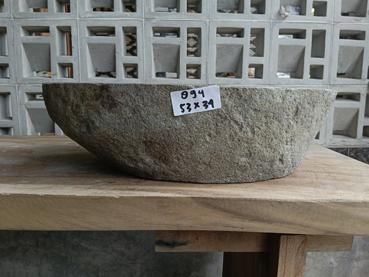 Front view of 6894-5334 river stone basin — polished interior