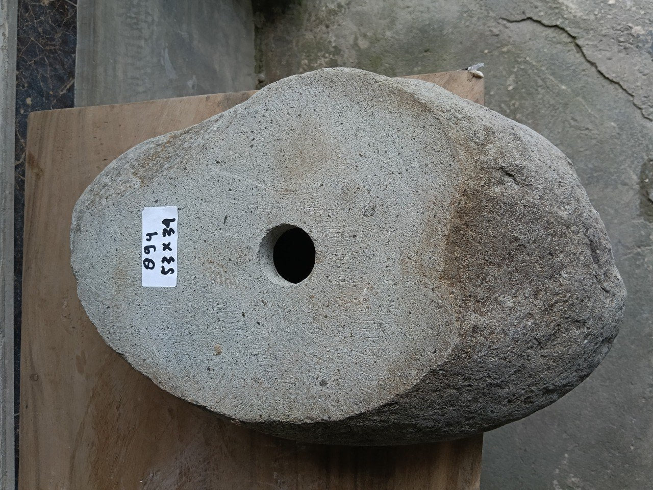 Bottom view of 6894-5334 solid river stone vessel